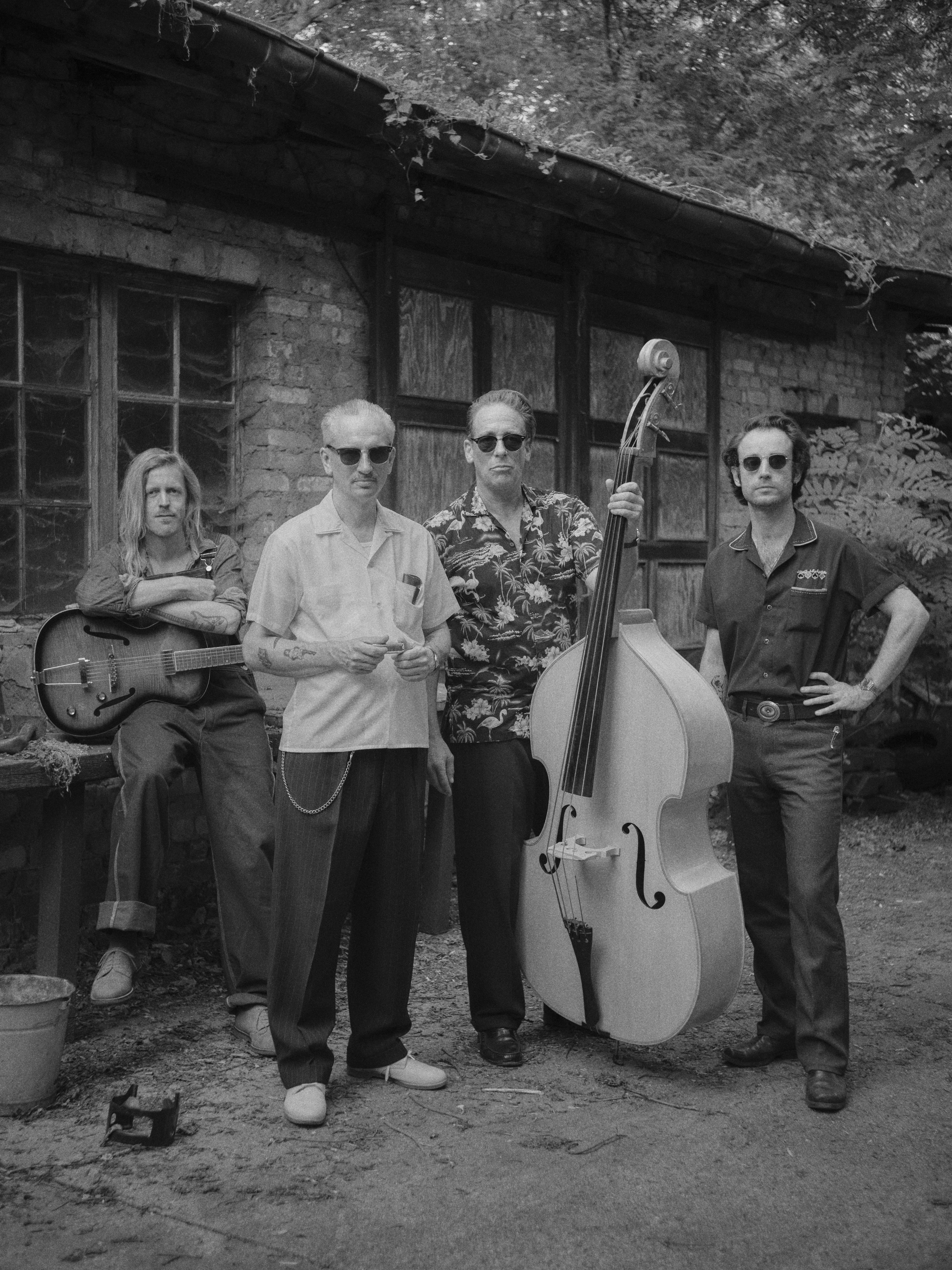The Blue Forty Five together with their instruments